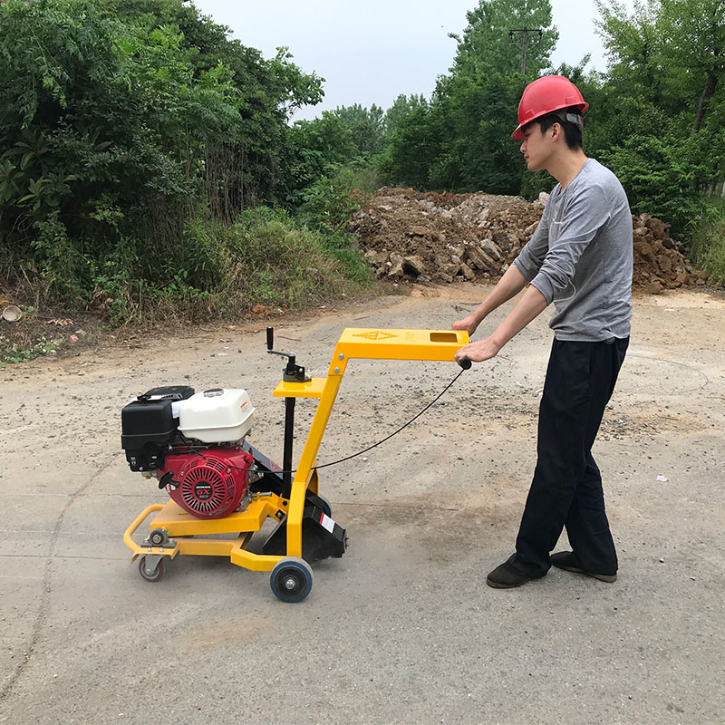 供應隆順汽油路麵開槽機混泥土地擴縫機小型瀝青水泥地麵切槽機